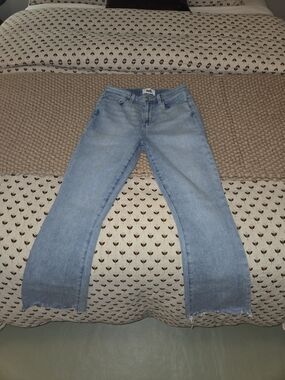 Light Blue Flared Jeans with Raw Hem